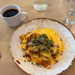 Fork and Plough signature dishes F & P Breakfast BowlBeef CarpaccioFried Oysters